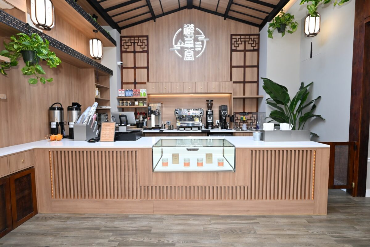 Latte art with warm pastry in an elegant café setting